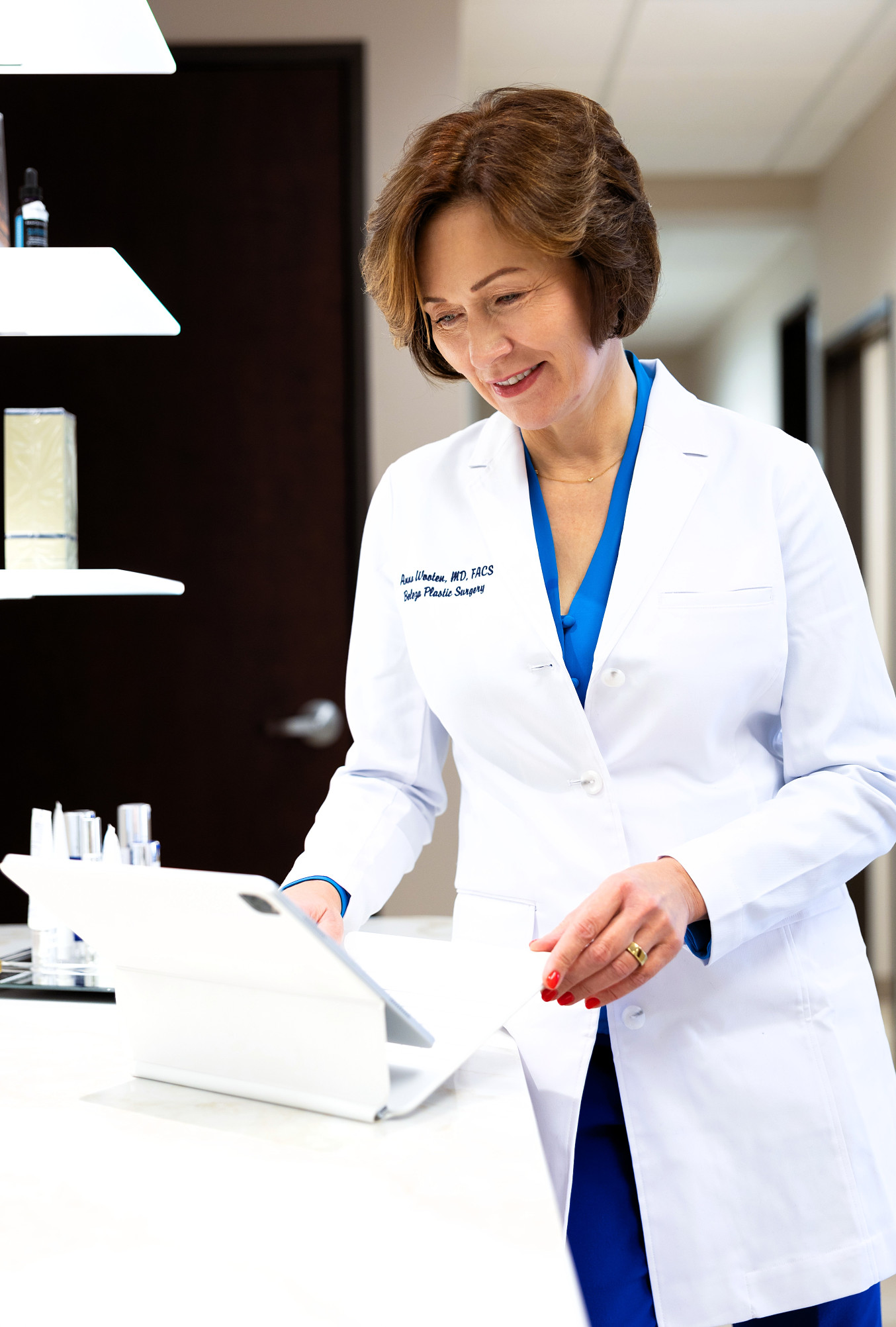 Physician in a white coat at the practice